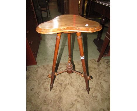 A late Victorian stained beechwood occasional table with shaped top (possibly associated) raised on tripod supports united by