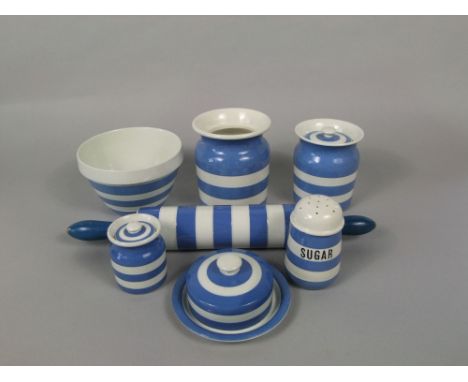 A collection of T G Green blue and white banded Cornish kitchen wares comprising a rolling pin with wooden handle, a sugar ca