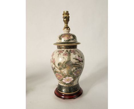 A Rochamp Kutani table lamp of ovoid form with painted and gilded bird and flowering tree detail, still with original label, 