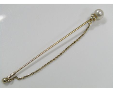 A 9ct stick pin set with three diamonds in trefoil formation and pearl to finial, in fitted box, 1.5g