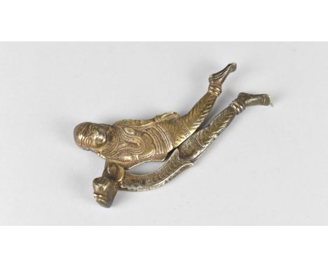 A Vintage Indian Metal Betel Nut Cracker in the Form of a Figure with Fish, 14cms Long 