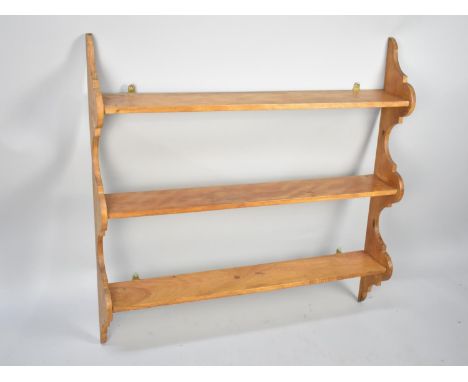 An Edwardian Wall Hanging Three Shelf Unit, 90cm wide and 89cm high 