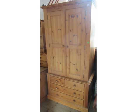 A modern pine wardrobe, width 39ins, height 79ins&nbsp;