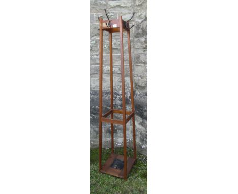 An Arts and Crafts style hall stand , with coat hooks
