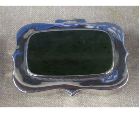 A silver snuff box, the cover set with agate