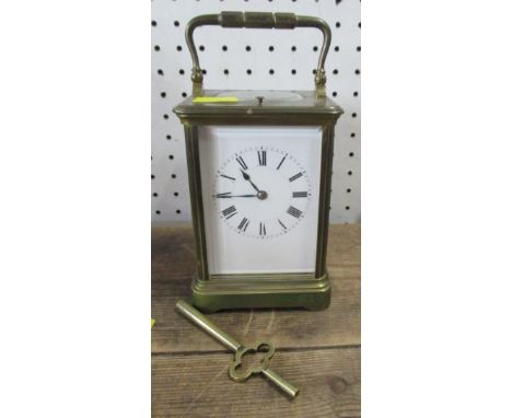 A brass cased repeating carriage clock