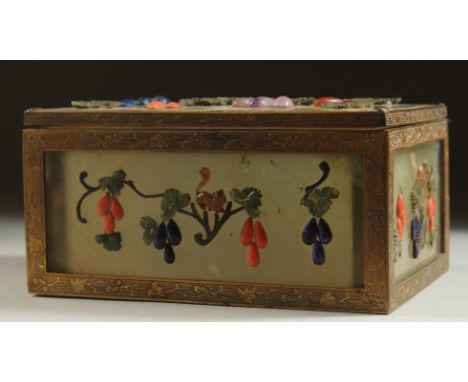 A 19TH CENTURY CHINESE JADE PANELLED RECTANGULAR BOX, overlaid with various stones depicting hanging fruits, the box construc
