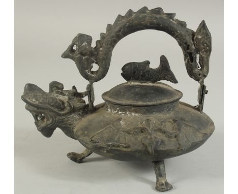 AN UNUSUAL CHINESE DRAGON FORM TEAPOT, the lid with fish shape finial, 19.5cm wide (spout to handle).