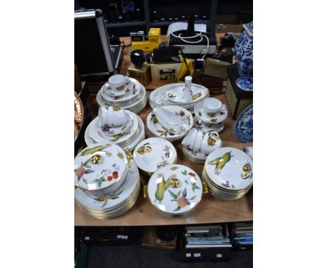 A large lot of Royal Worcester 'Evesham' table ware, including tureens, plates, bowls and cups and saucers.