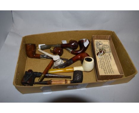 An assorted collection of vintage smoking pipes, to include Bruyere pipes, a bamboo shanked pipe, and a clay Mothering Girl p