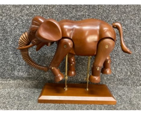 A wooden artist’s articulated mannequin in the form of an elephant 35cm long