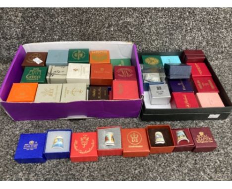 A collection of ceramic thimbles by various makers to include Coalport and Royal Grafton, all boxed