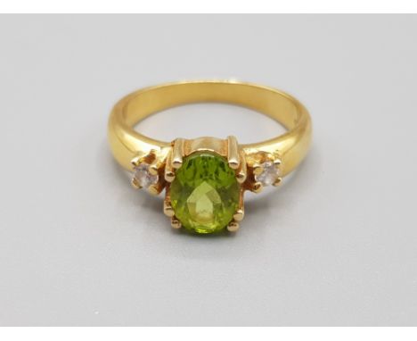 14ct Gold and peridot ring. VGC 4.2g Size N 1/2