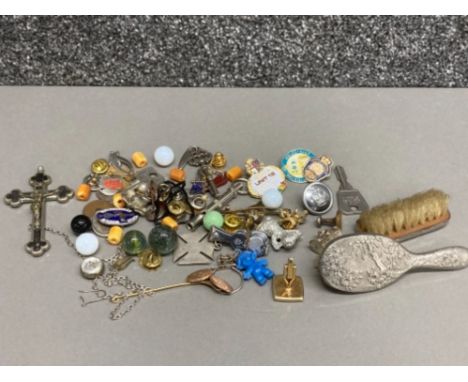 Tray of miscellaneous items to include doll’s brushes, enamelled badges and pins, dog whistle, white metal charms etc
