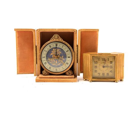 Vintage Swiss alarm clock, metal case with einge turning, 6.5cm, and another vintage gilt metal cased alarm clock, cased.Qty: