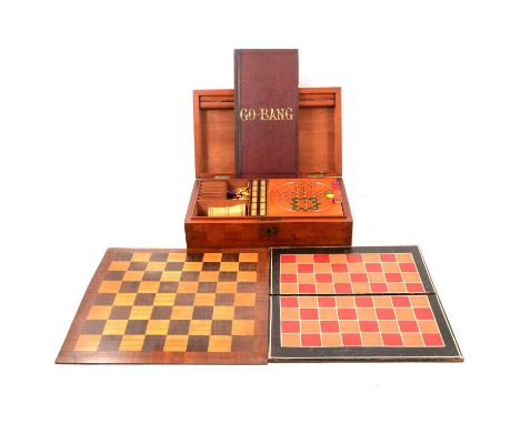 Edwardian mahogany games compendium, the lid with two folding boards for Go-Bang, Steeplechase, backgammon and chess, six lea