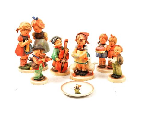 Small collection of Goebel Hummel figures, two girls 'Knitting Lesson', 1963; girl with ducks, 'Be Patient', 1948; two girls 