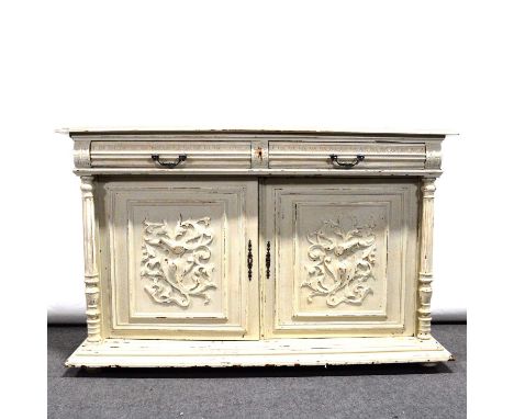 Painted French buffet, rectangular top with two frieze drawers, above a pair of cupboards with moulded and cavred scrolled fo