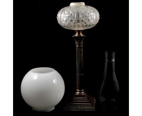 Edwardian electroplated Corinthian column lamp, glass reservoir, with shade and chimney but lacking burner.Condition report:T