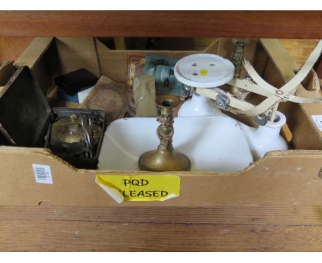 A Ronson brushed metal cigarette lighter in box, pair of brass candlesticks, kitchen scales, Primus stove and books 