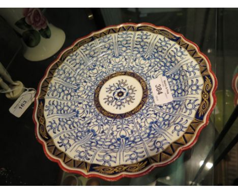 A Worcester Royal Lily pattern side plate with pie-crust edge, crescent mark, 23cm diameter 