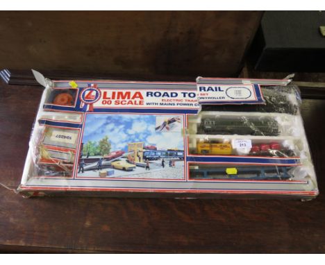 Lima HO/OO scale Road to Rail electric train set and East Anglian meat goods truck 