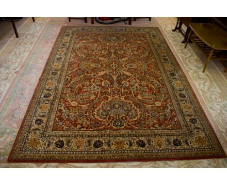 An European Zeigler style carpet, red field with foliate design and multiple border, 300cm x 200cm 