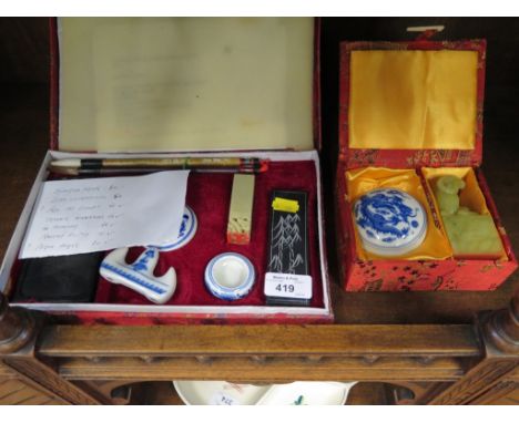 A vintage Chinese calligraphy writing set in original silk box together with a carved soapstone stamp and red paste pot in or