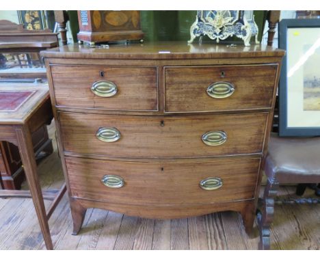 A George III mahogany bowfront chest of drawers, with two short and two long graduated drawers on outsplayed bracket feet, 91