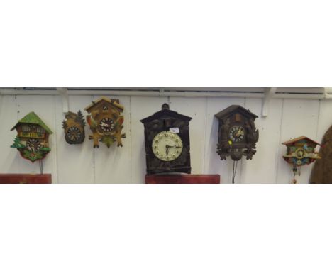 A Soviet Majak plastic cuckoo clock, 29cm high and five other German cuckoo clocks 