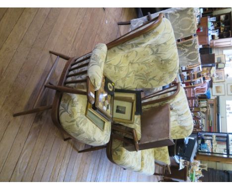 An Ercol Windsor design two seat settee and armchair, in stained beech 1980's (2) 