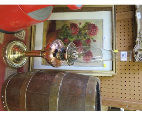 A brass and copper column oil lamp 63cm high 