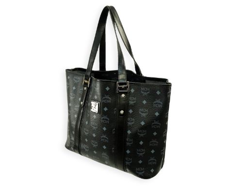 MCM Black Visetos Coated Canvas Shopping Tote. Silver tone hardware, gray canvas interior, black leather straps. Labeled appr