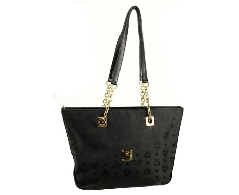MCM Black Visetos Canvas Shoulder Tote. Golden brass hardware, matching interior, leather handles. Labeled appropriately. Ser