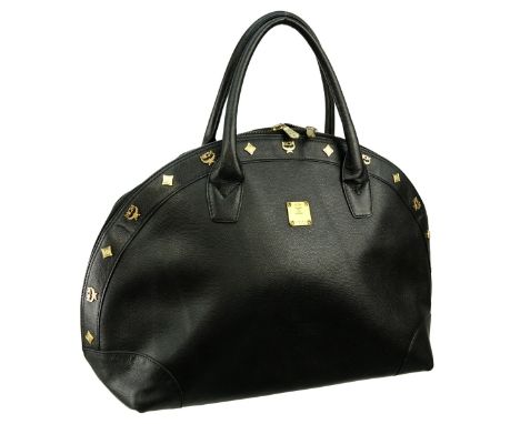MCM Black Leather Top Handle Dome Bag. Beige suede interior, gold tone hardware. Dustbag included. Labeled appropriately. Ser