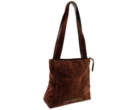 Chanel Vintage Dark Brown Suede Shoulder Bag With Front Slip Pocket. Gold tone hardware, brown satin interior. Authenticity c