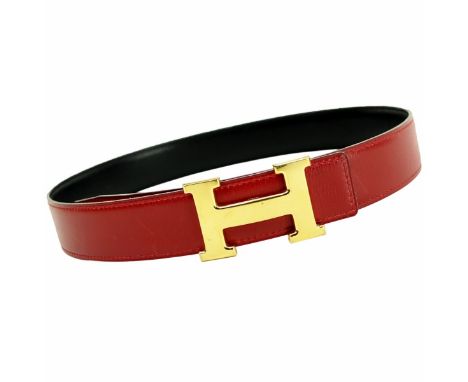 Hermes Rouge/Black Leather and Gold H Belt 70. Labeled appropriately. Measures 33-1/4" L. Condition: Pre-owned, light scuffs.