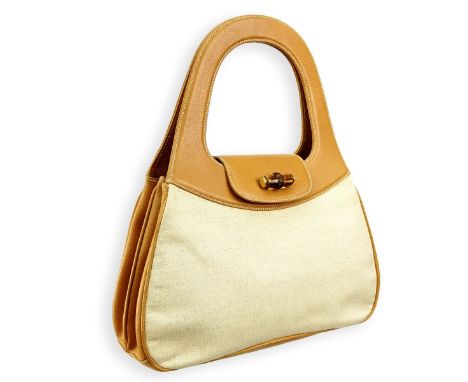 Gucci Vintage Beaige and Tan Canvas & Leather Top Handle Handbag. Goldtone and bamboo hardware, leather interior. Labeled app