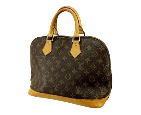Louis Vuitton Brown Canvas Monogram Alma PM. Golden brass hardware, brown interior with slot and patch pockets, vachetta hand