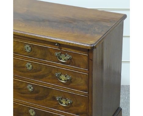 A George III mahogany batchelor's chest of 4 long drawers of small size, with brushing shandles and bracket feet, width 2'6",