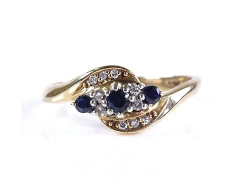 A 9ct gold sapphire and diamond crossover ring, setting height 9mm, size S, 3.2g 