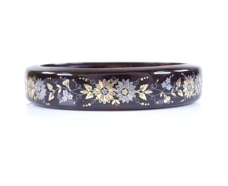 A Victorian gold silver and tortoiseshell pique inlay bangle, with floral decoration, internal diameter 58.4mm, internal heig