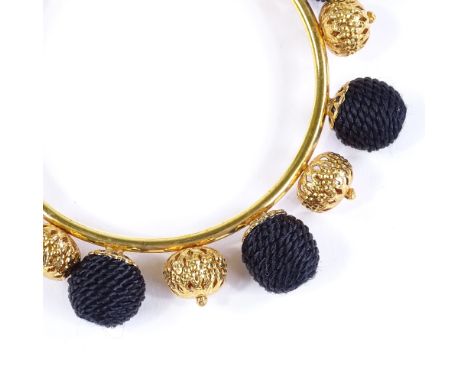 A Dolce &amp; Gabbana brass and black rope bangle, internal diameter 65mm, boxed 