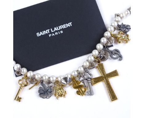 An Yves Saint Laurent pearl charm bracelet, length 20cm, boxed 