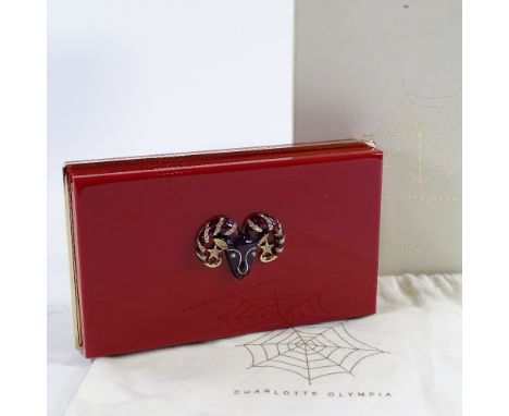 A Charlotte Olympia designer evening bag, with paste and enamel ram's head mount, length 19cm, boxed with dust bag 