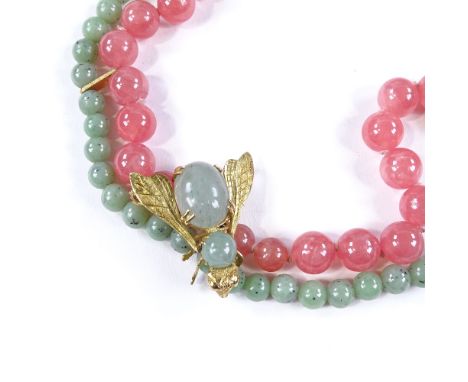 A double-strand grossular garnet, Russian jade, and rhodochrosite polished bead necklace, with 18ct gold mounts and 18ct figu