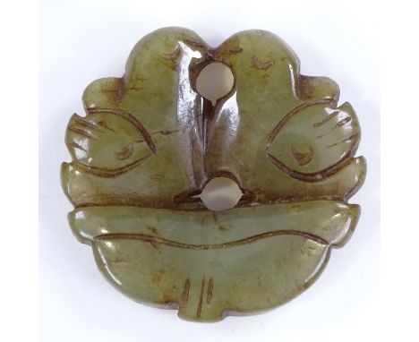 A Chinese carved and pierced jade bird design disc pendant, 5cm across 