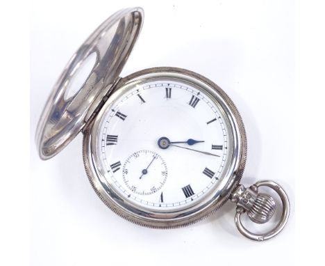A silver-cased half hunter side-wind pocket watch, with engine turned decoration, Roman numeral hour markers and subsidiary s