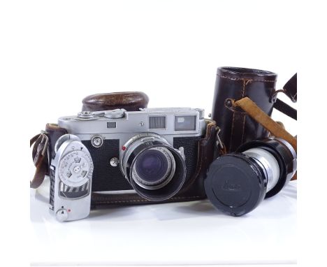 A Leica M2 camera, circa 1959, serial no. 936958, with original 9cm F4 Elmar lens (some internal haze), Leica top-mounted lig