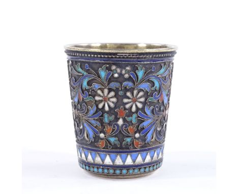 A 19th century small Russian silver and enamel drinking tot, with floral design champleve enamel decoration and reeded border